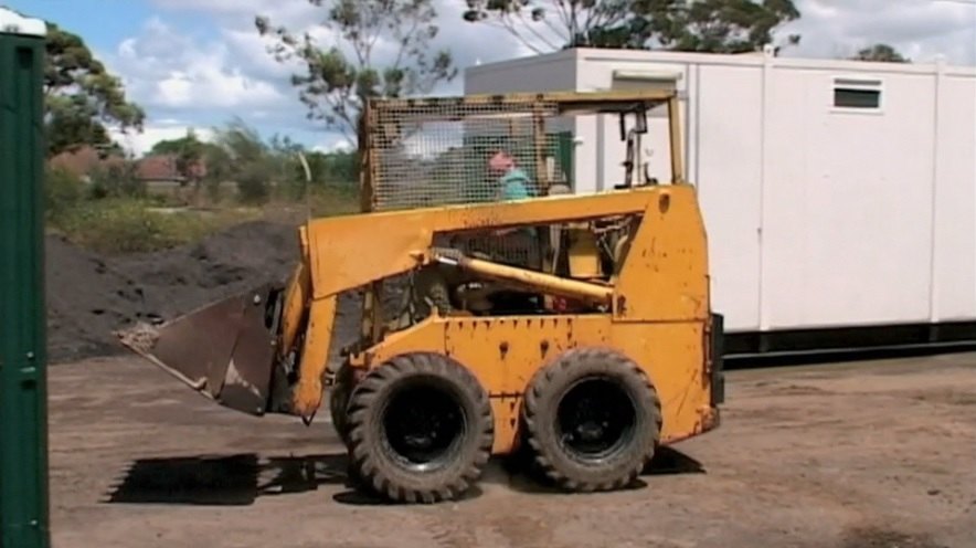 John Deere JD-24 Skid Steer